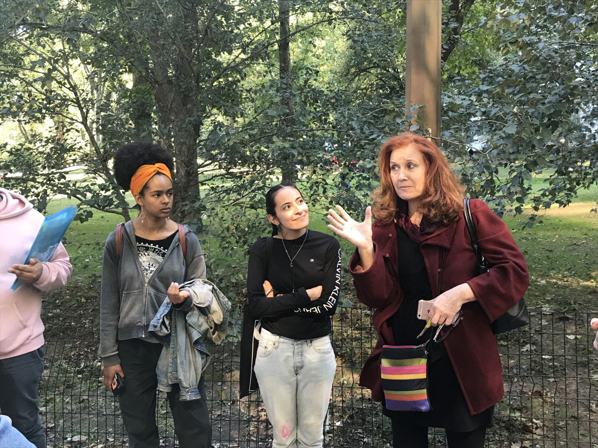 Karen Finley leading discussion in Central Park